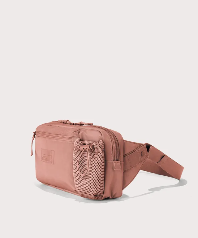 dagne-dover-cairo-sling-bag-in-warm-dust-sustainable-travel-sling-with-water-bot image 1