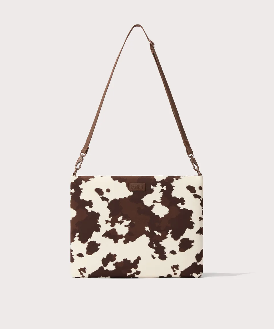 dagne-dover-reid-computer-sling-in-cow-print-16-inch-neoprene-laptop-sleeve-with image 1