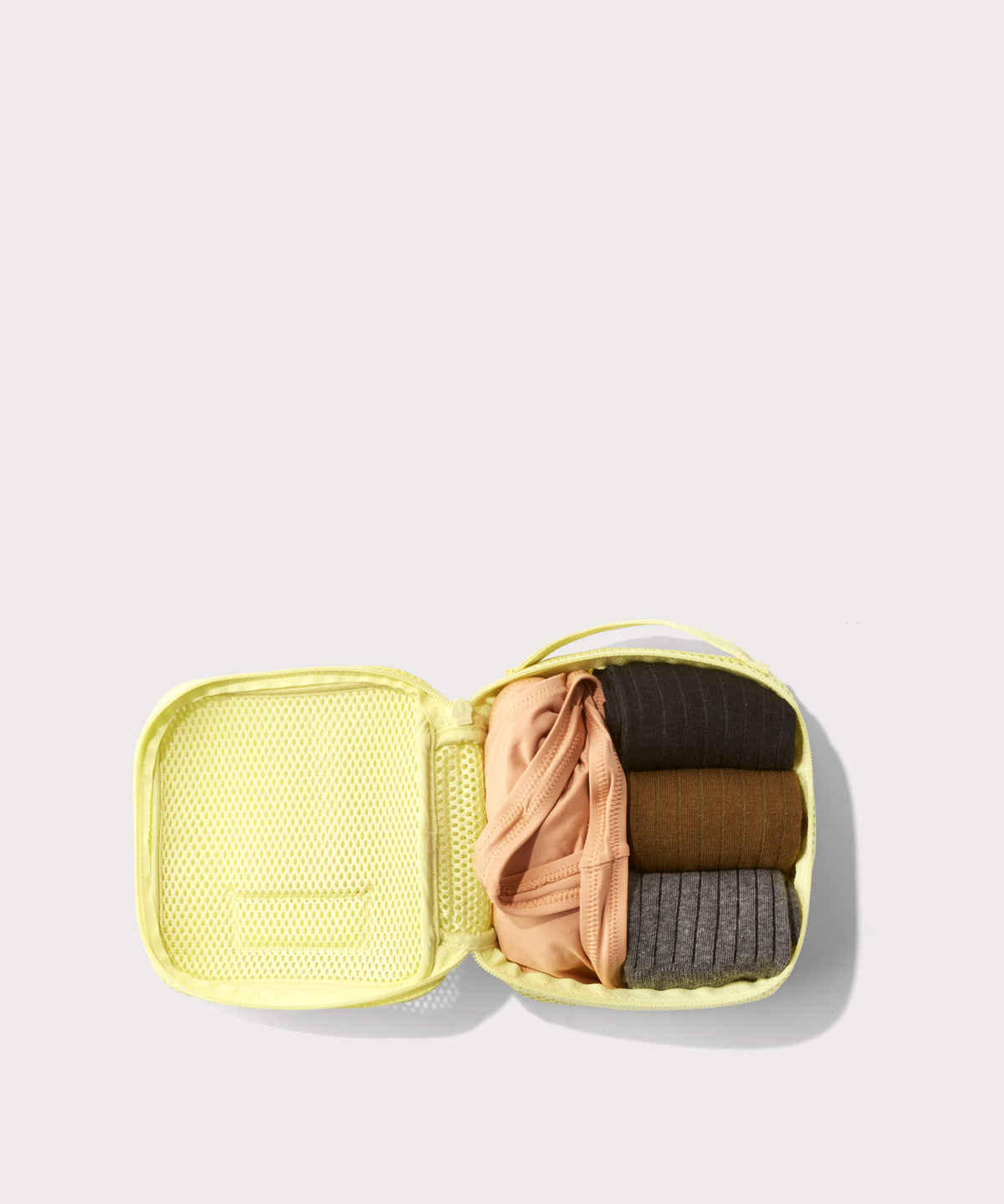 dagne-dover-roma-packing-cube-small-in-citrine-air-mesh-lightweight-travel-organ image 2