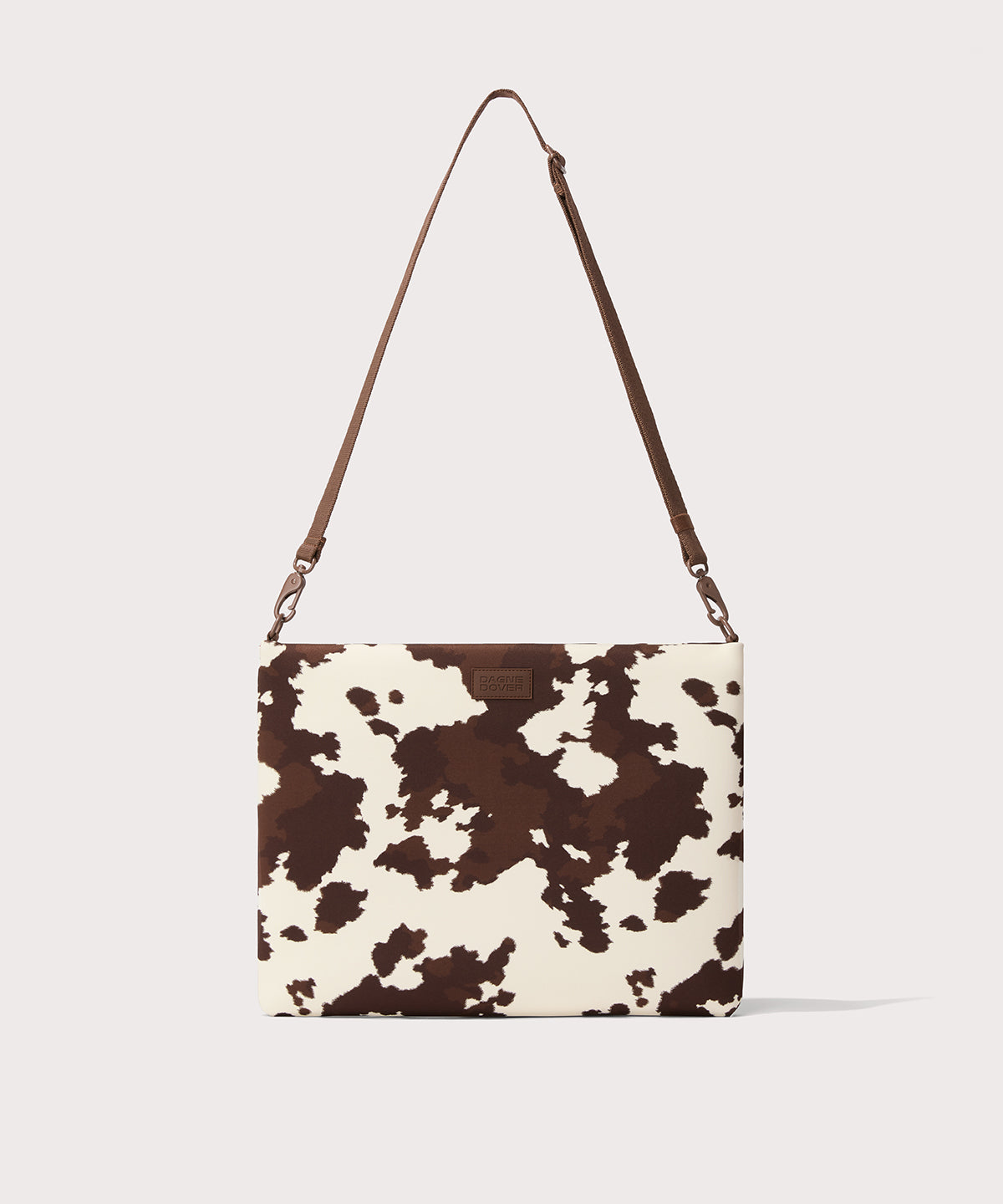 dagne-dover-reid-computer-sling-in-cow-print-16-inch-neoprene-laptop-sleeve-with image 1