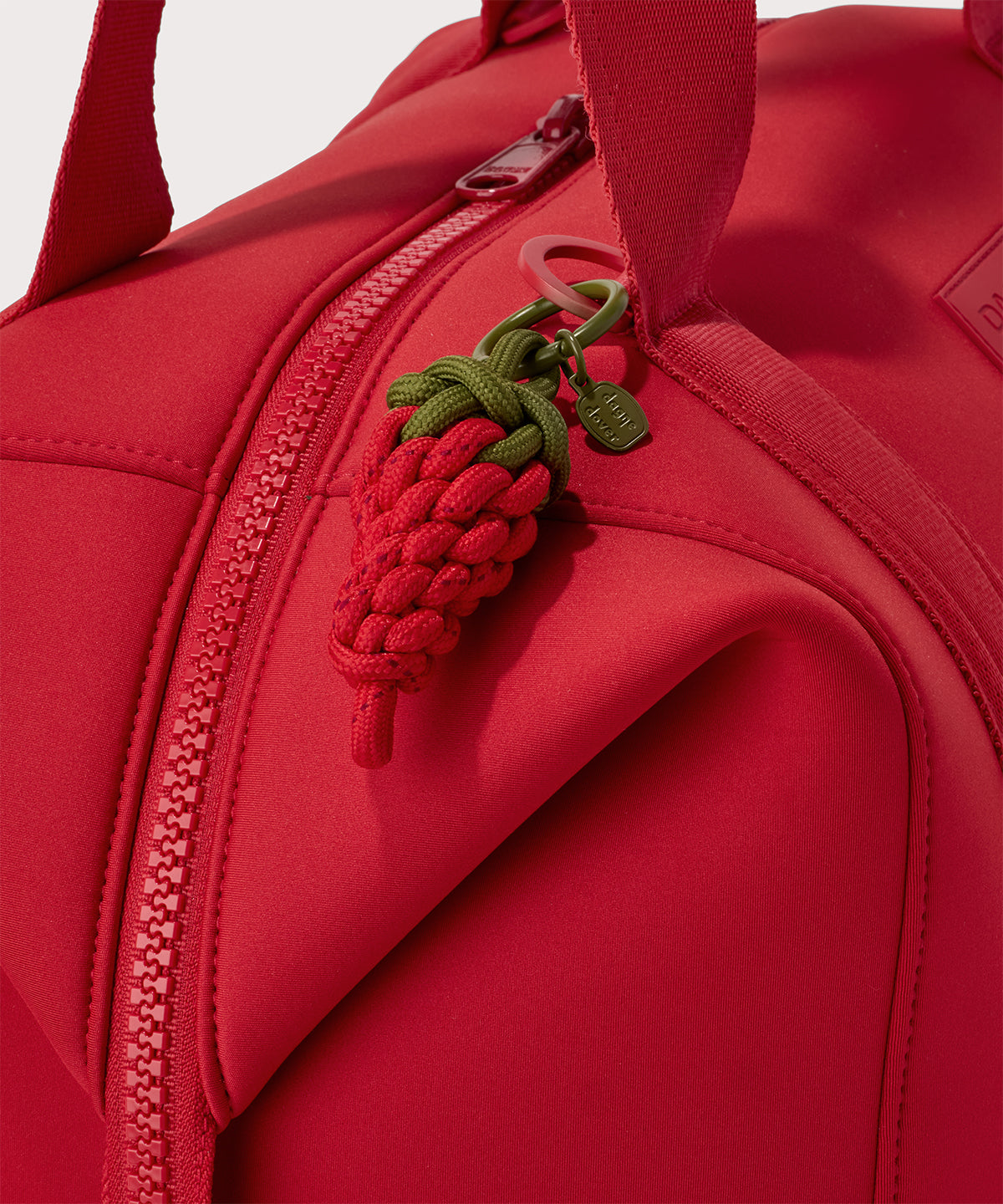 dagne-dover-picante-keychain-in-cherry-neoprene-keychain-with-zippered-pocket-an image 2